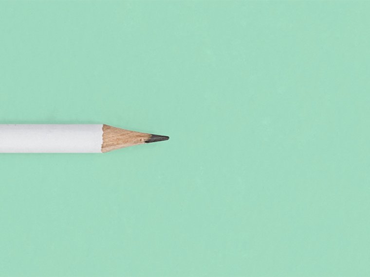 pencil on a light green background